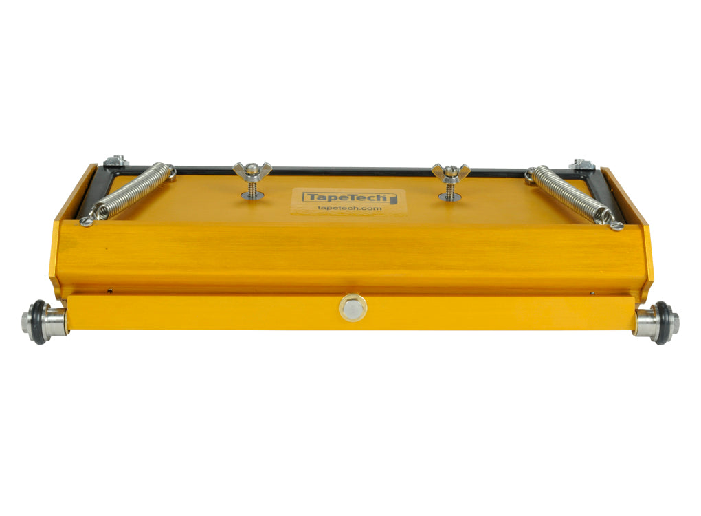 12-inch TapeTech EasyClean Finishing Box with gold aluminum body, brass blade holder, and crown control, back view