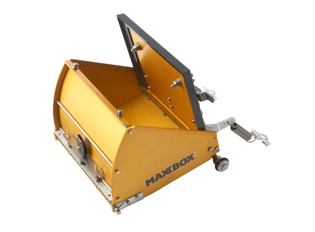 Open 7-inch TapeTech Power Assist MAXXBOX Flat Box with gold aluminum body, brass blade holder, and crown control