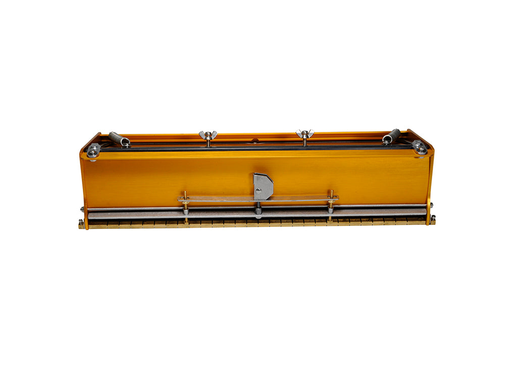 15-inch TapeTech EasyClean Finishing Box with gold aluminum body, brass blade holder, and crown control, front view