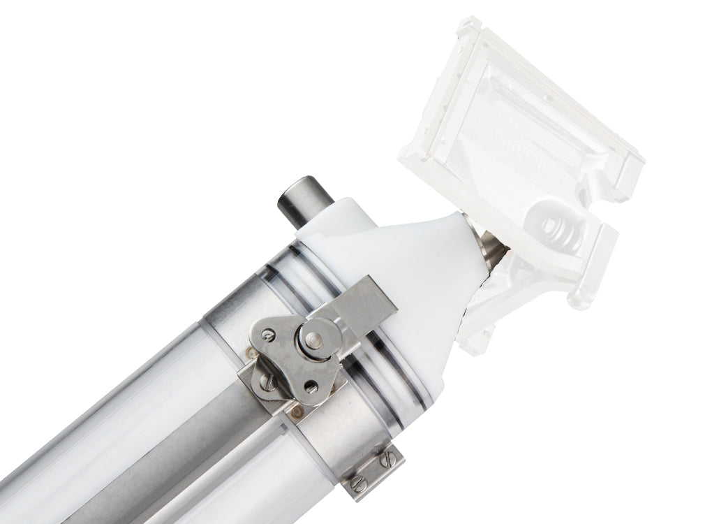 Close-up of TapeTech 14TT MudRunner head with clear tube and corner finisher head attached