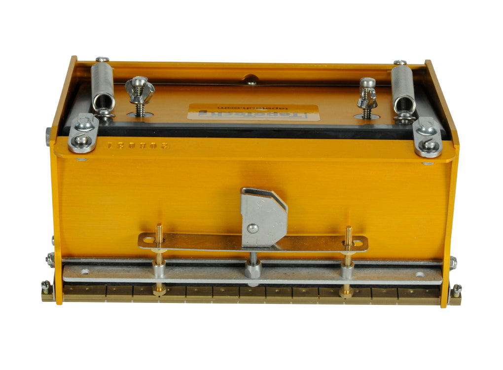 7-inch TapeTech EasyClean Finishing Box with gold aluminum body, brass blade holder, and crown control, front view