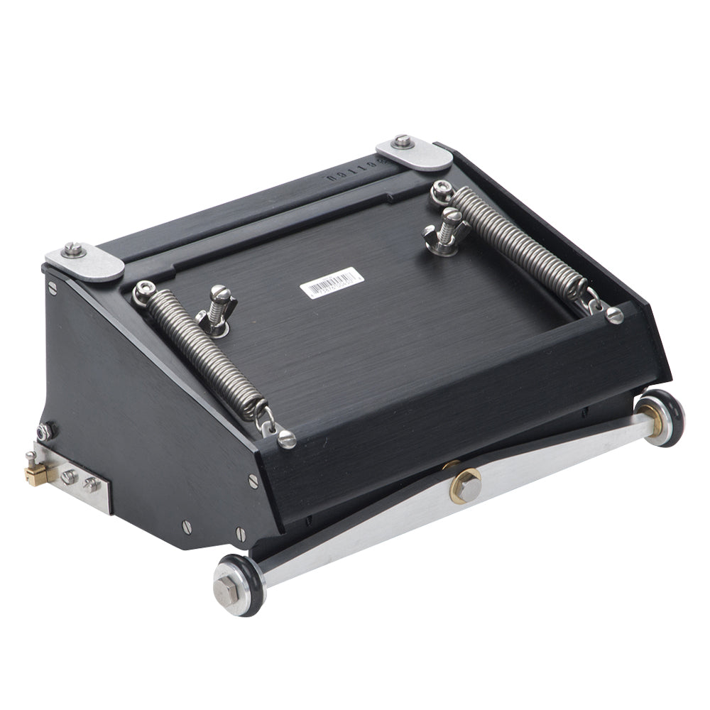 7-inch Asgard Finishing Box made with black anodized aluminum, brass blade holder, steel blade, adjustable crown, and wheels, left back top view