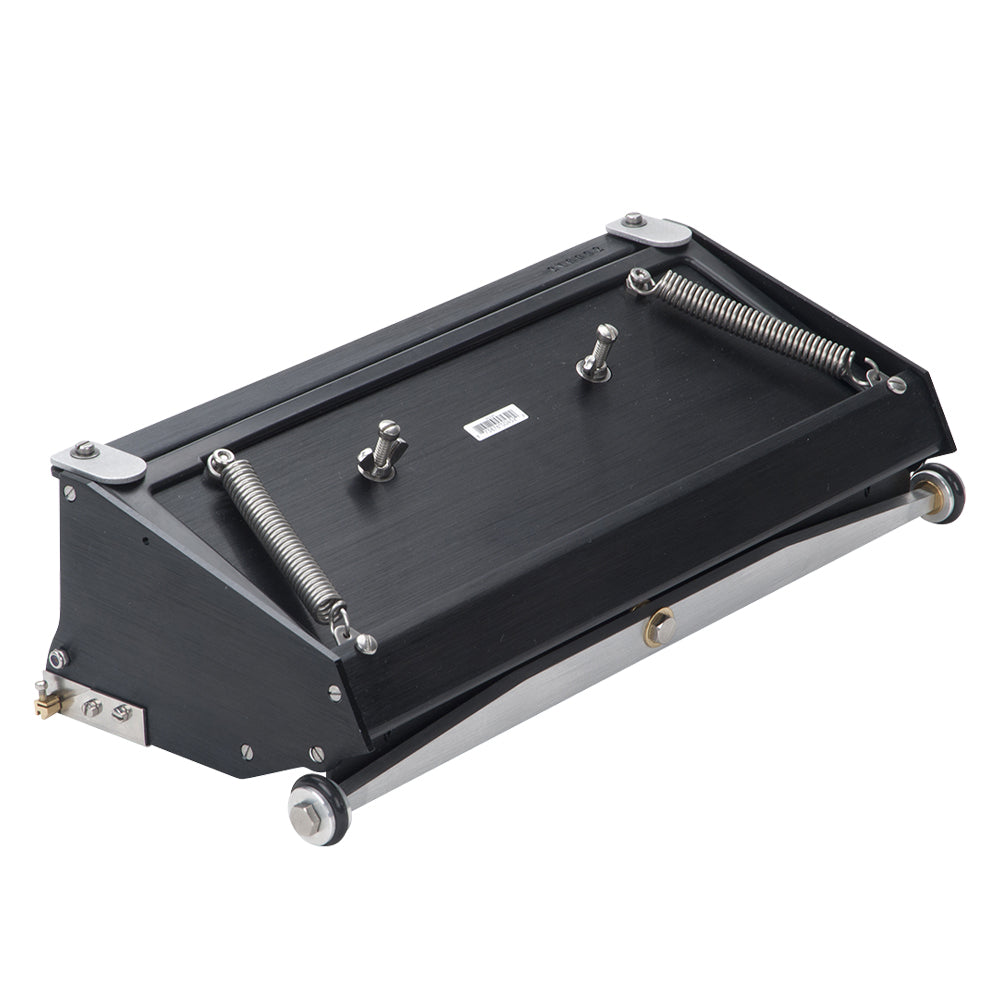 12-inch Asgard Finishing Box made with black anodized aluminum, brass blade holder, steel blade, adjustable crown, and wheels, back left quarter view