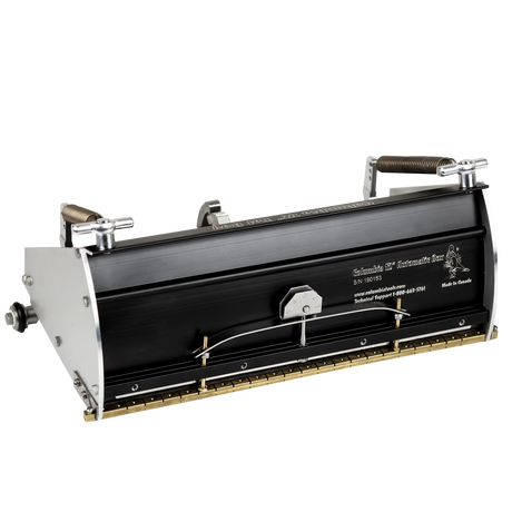 12-inch Columbia Automatic Fat Boy Finishing Box made from billet aluminum with a black painted finish, steel components, a brass blade holder, and wheels