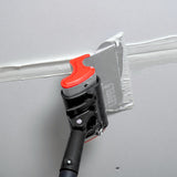 Level 5 skimming blade pole adaptor attached to a painter’s pole, holding a Level 5 smoothing blade smoothing over tape