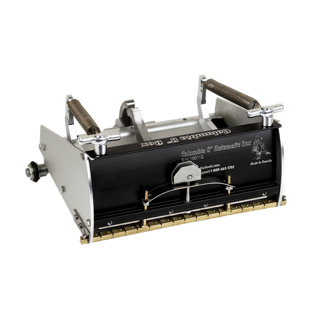 8-inch Columbia Automatic Flat Finishing Box made from billet aluminum with a black painted finish, steel components, a brass blade holder, and wheels